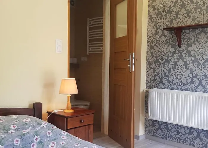 Gosciniec Pod Brzegiem B&B 우스트론